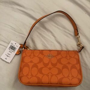 Orange Coach pochette purse